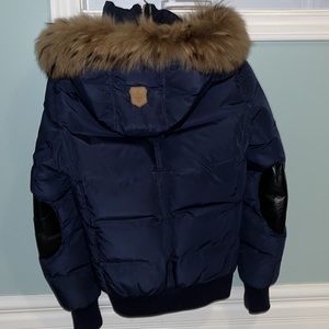 Mackage jacket with leather elbow patches, down filled.